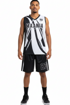 Maania Wears black and white sleeveless training uniform set laid flat on green turf, showing jersey graphics and matching shorts.