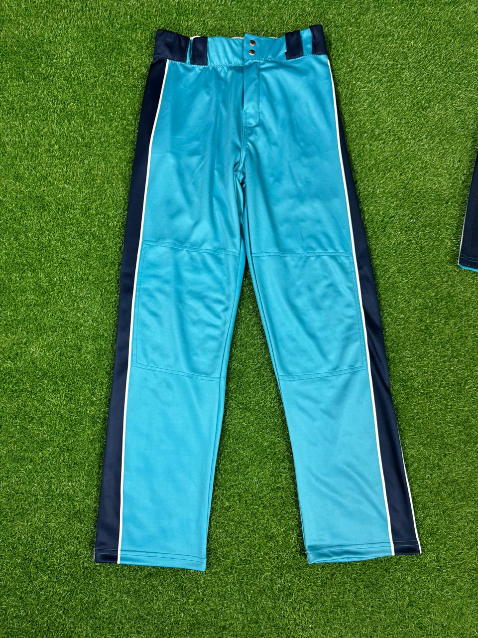 Side view of cyan baseball pants showing navy vertical stripe and white piping.